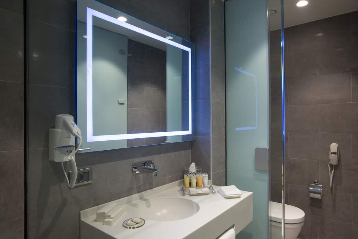 shower, eco-friendly toiletries, hair dryer, slippers