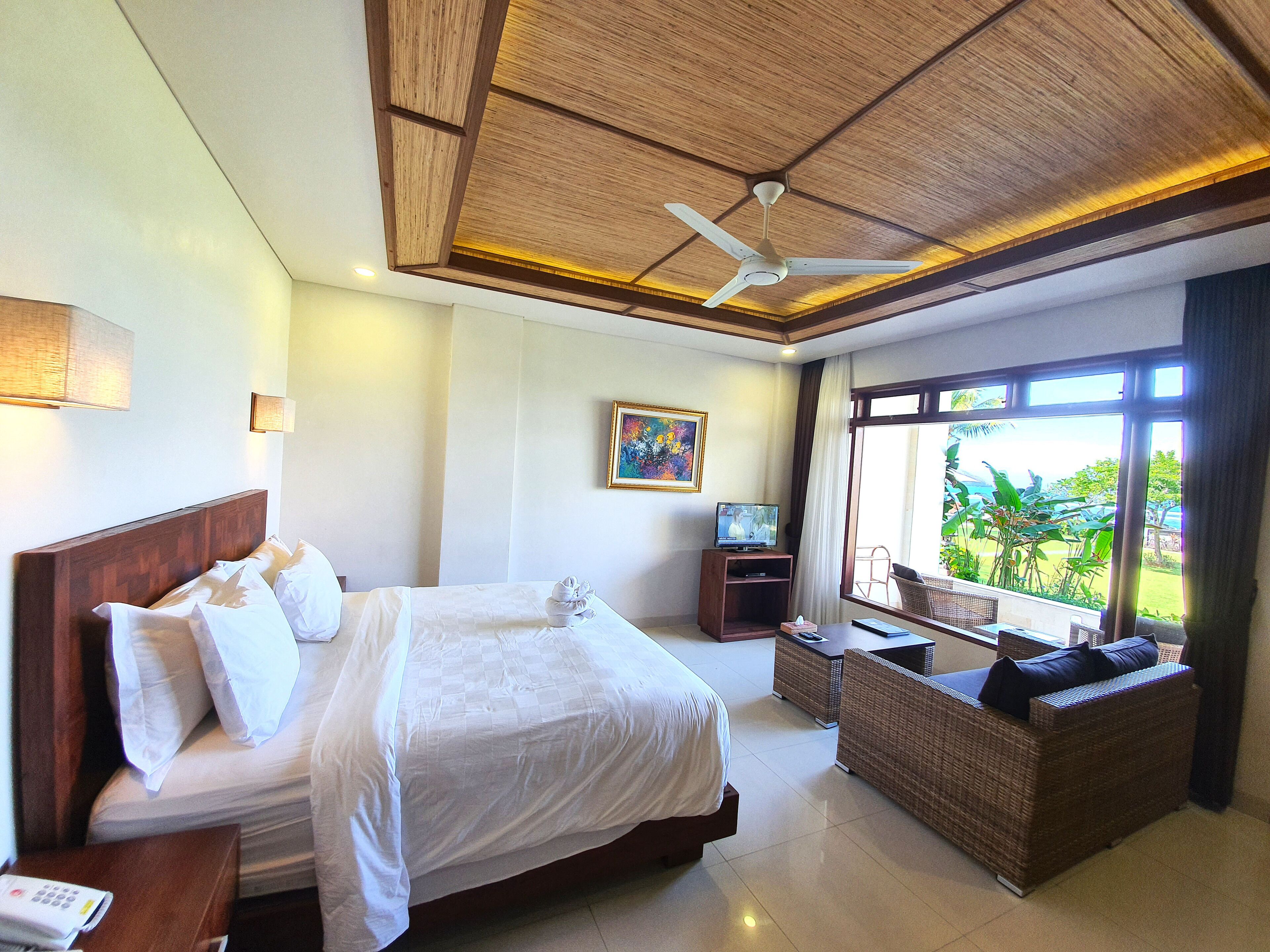garden deluxe double or twin room, sea view | 1 bedroom, minibar, in-room safe, individually furnished