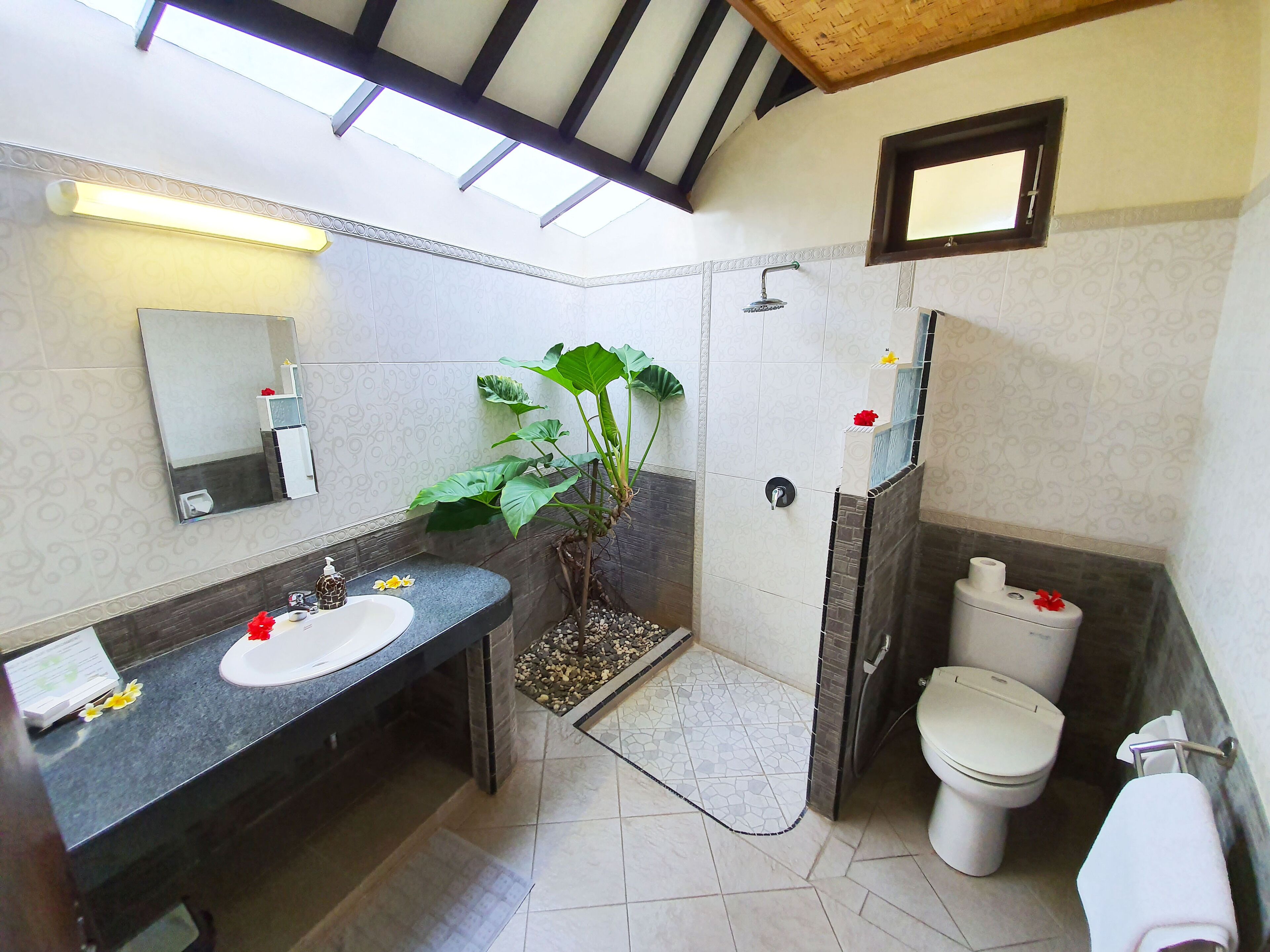 bungalow, ocean view | bathroom | shower, rainfall showerhead, free toiletries, hair dryer