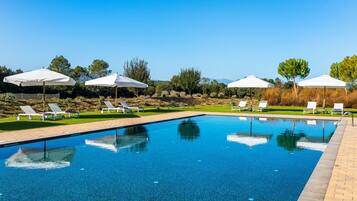 Outdoor pool, pool umbrellas, pool loungers