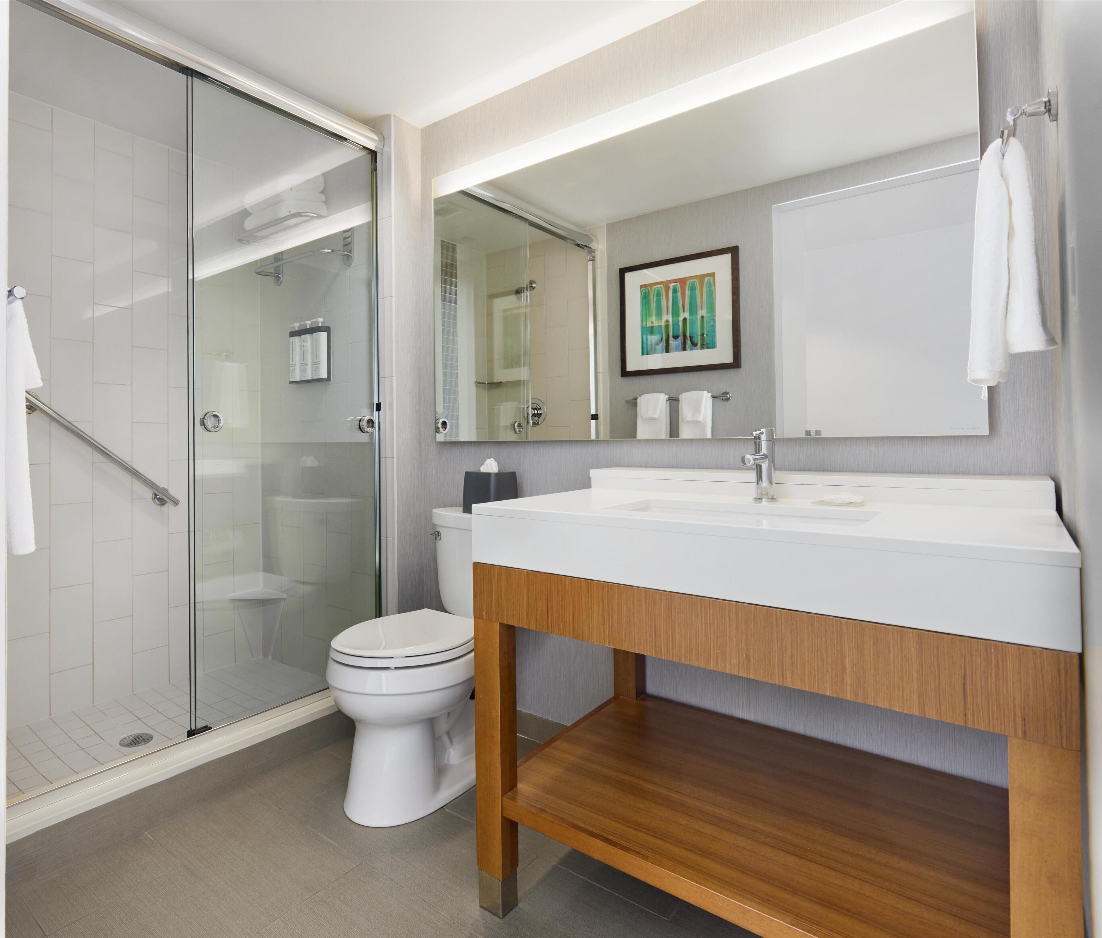 suite, 1 king bed | bathroom | free toiletries, hair dryer, towels, soap