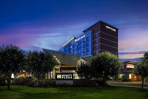 A multi-story hotel with a prominent sign reading "Hyatt Place".