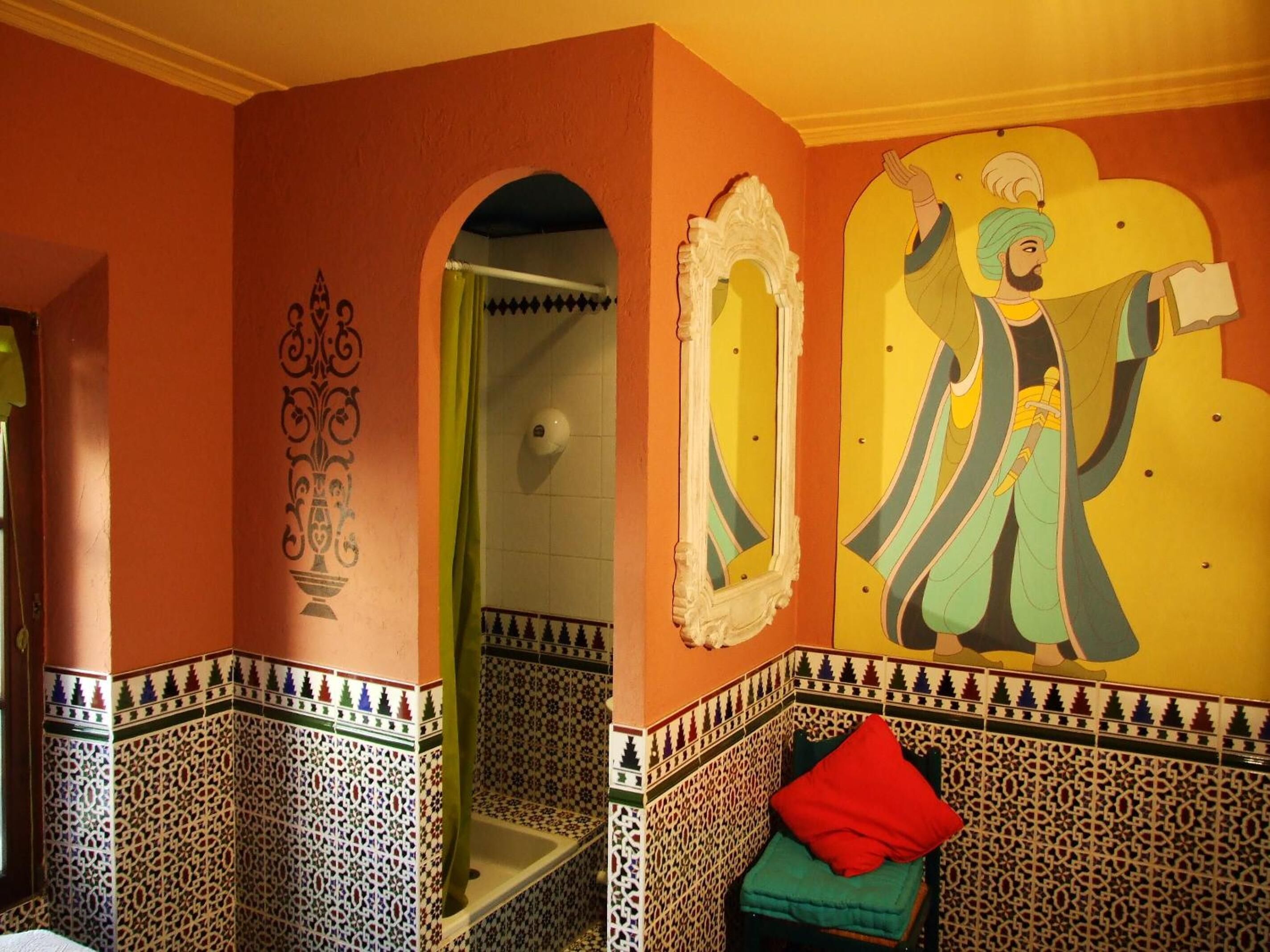 Regadera, secadora de cabello, toallas 