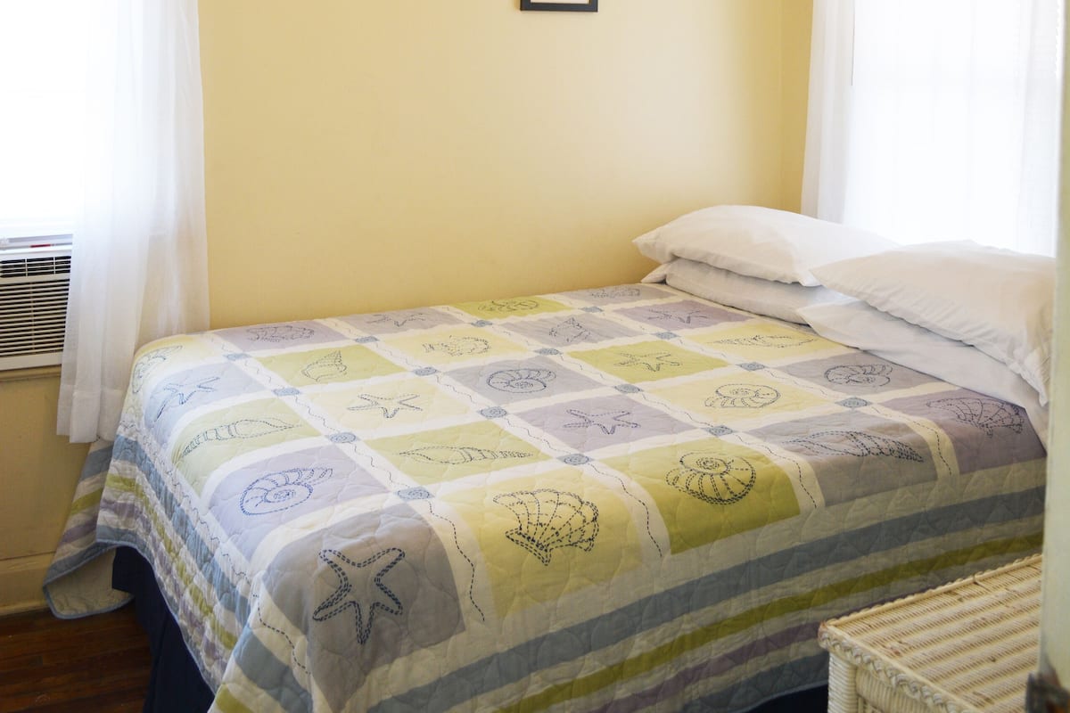 Cottage 1, 1 Bedroom | 1 bedroom, pillowtop beds, individually decorated