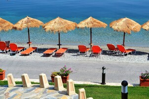 On the beach, sun loungers, beach umbrellas, fishing