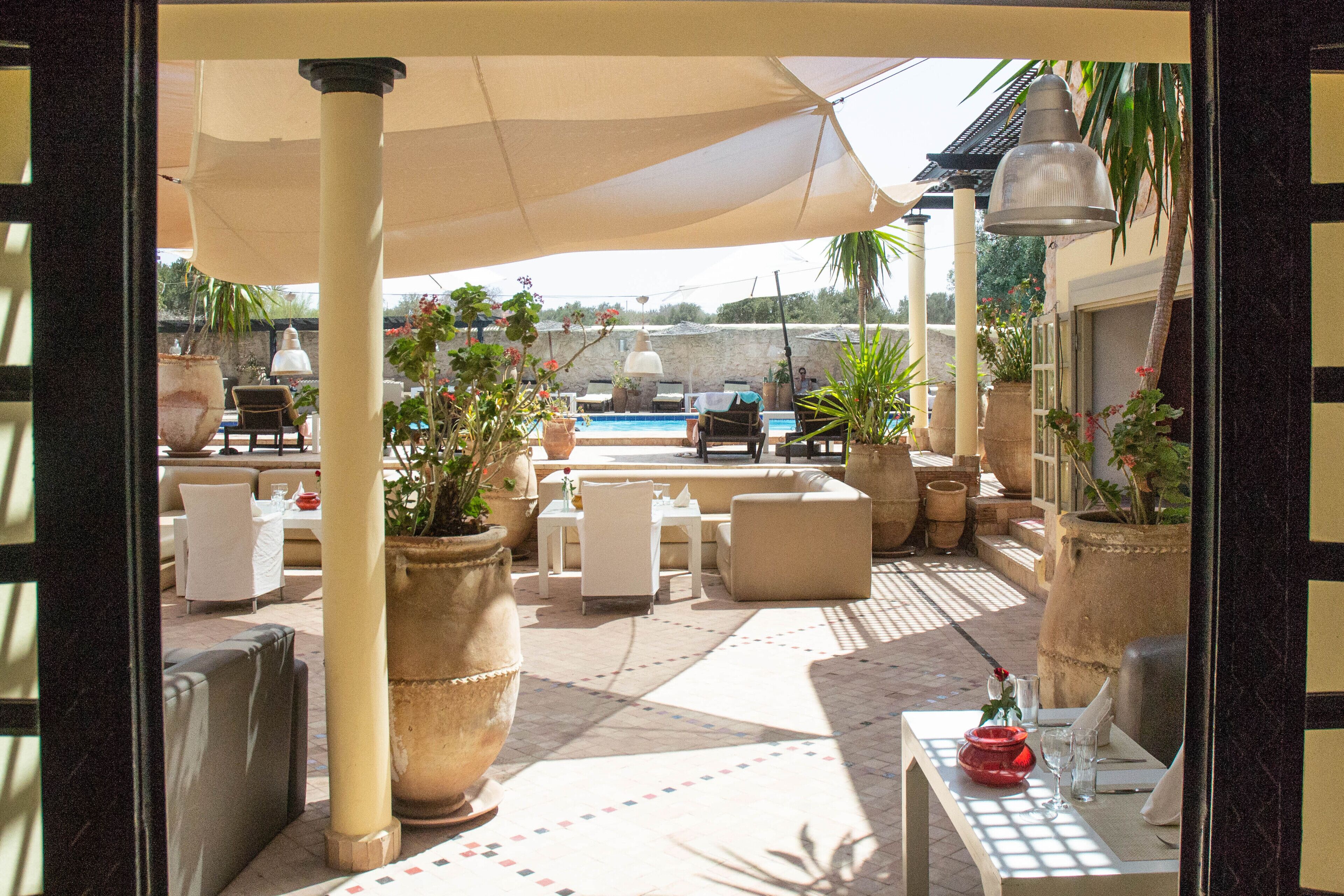 breakfast, lunch served; international cuisine, pool views