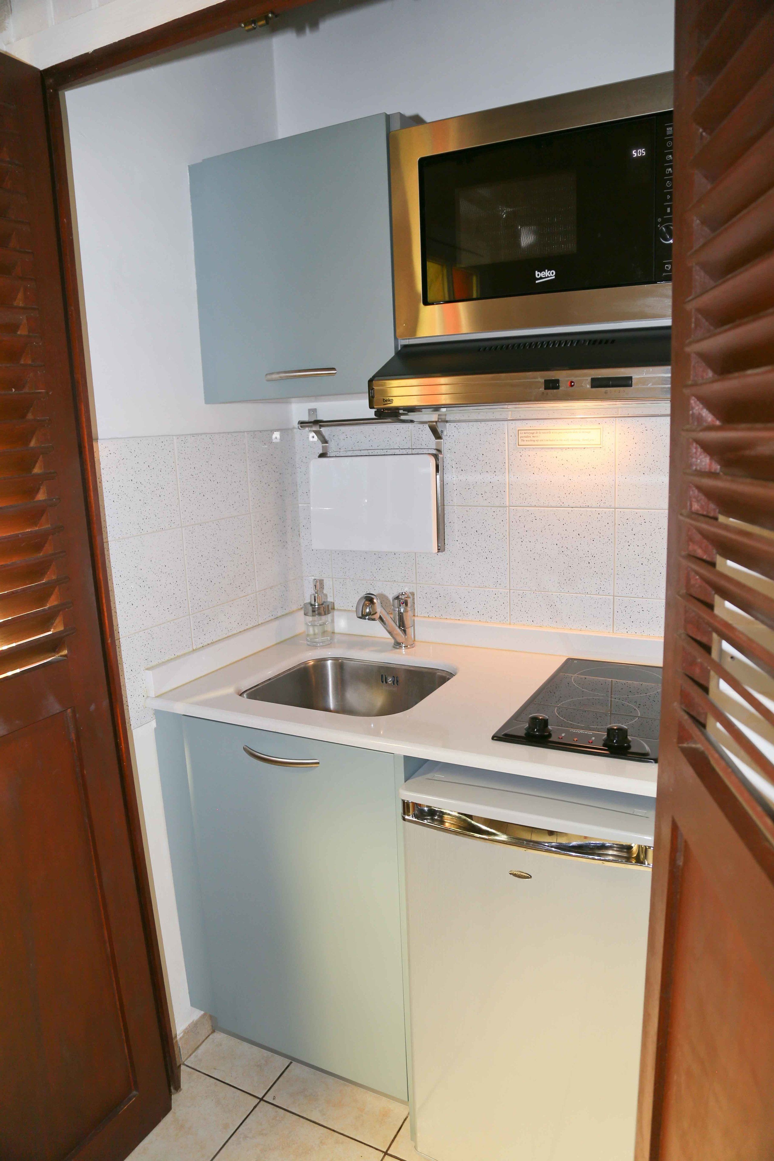 classic duplex, garden area | private kitchenette | fridge, microwave, stovetop, electric kettle