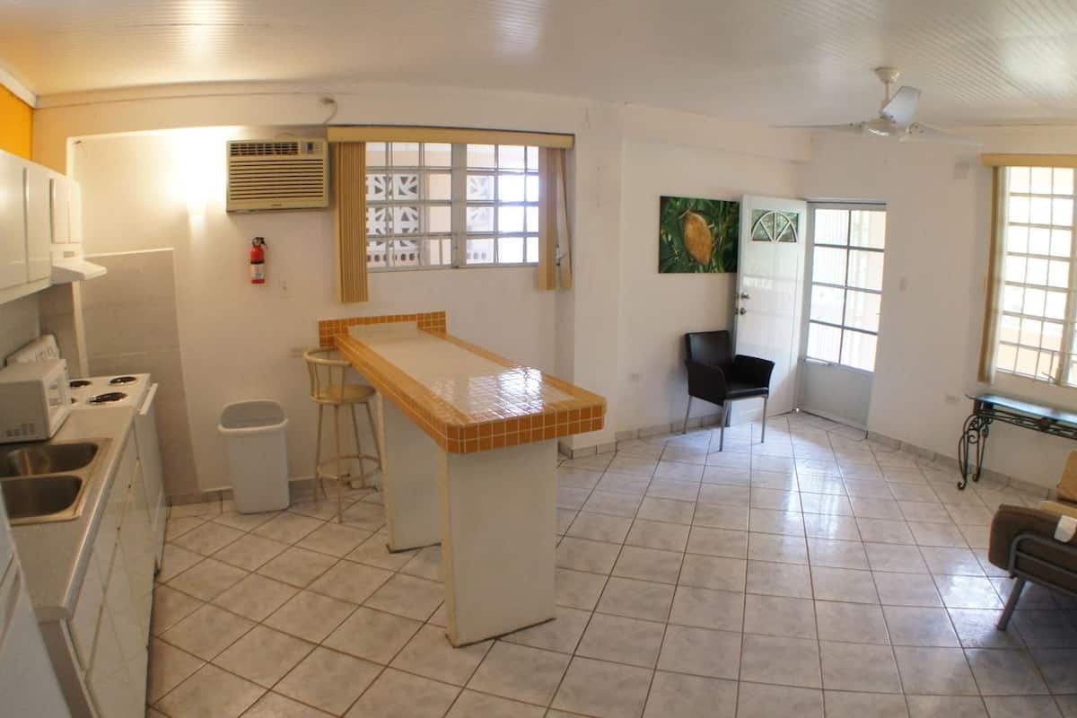 family suite, 1 bedroom | private kitchen | fridge, microwave, stovetop, cookware/dishes/utensils