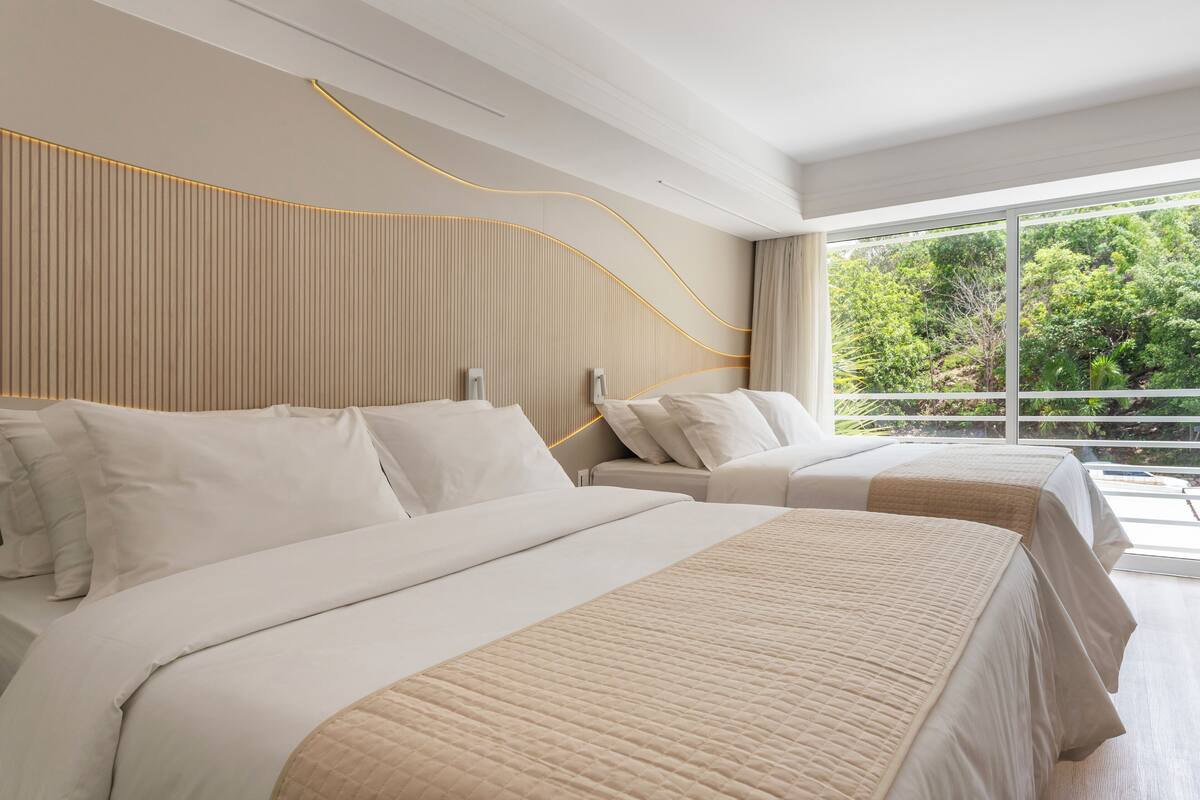 family suite | 1 bedroom, minibar, in-room safe, desk