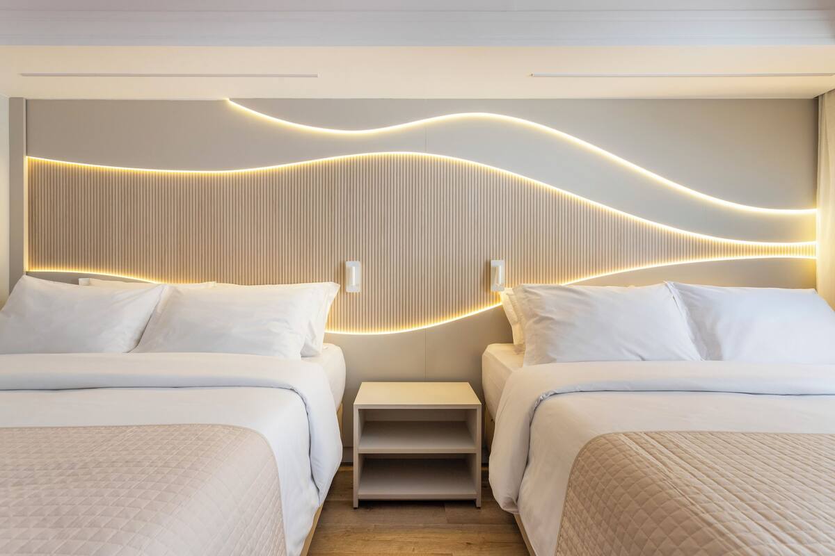 family suite | 1 bedroom, minibar, in-room safe, desk