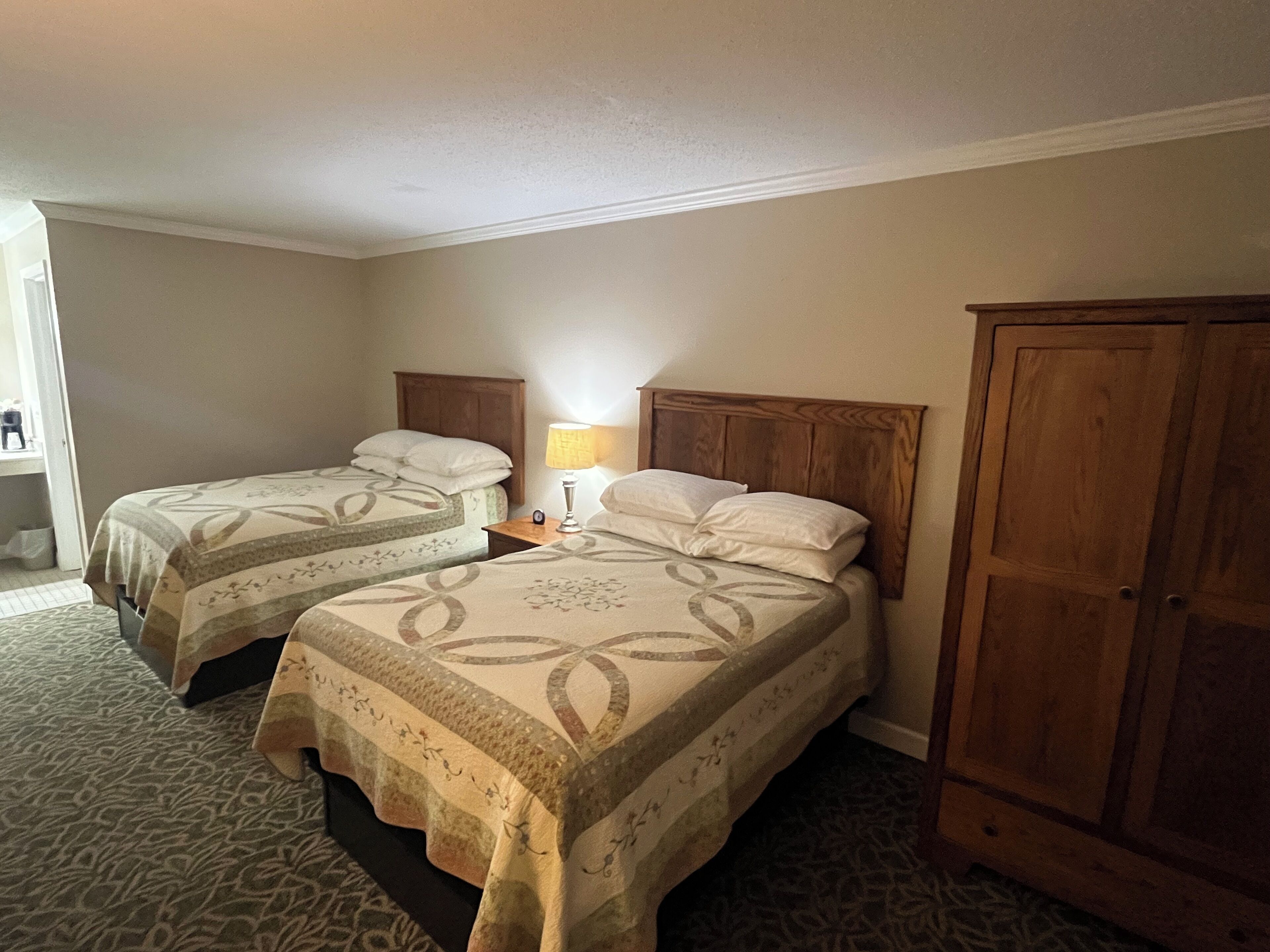 Memory-foam beds, desk, laptop workspace, iron/ironing board