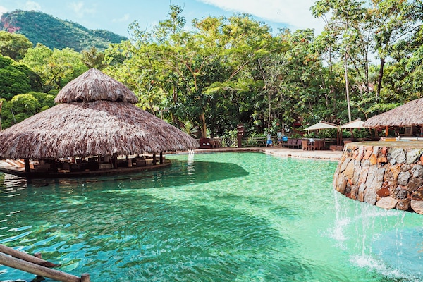Indoor pool, 15 outdoor pools, free cabanas, pool umbrellas