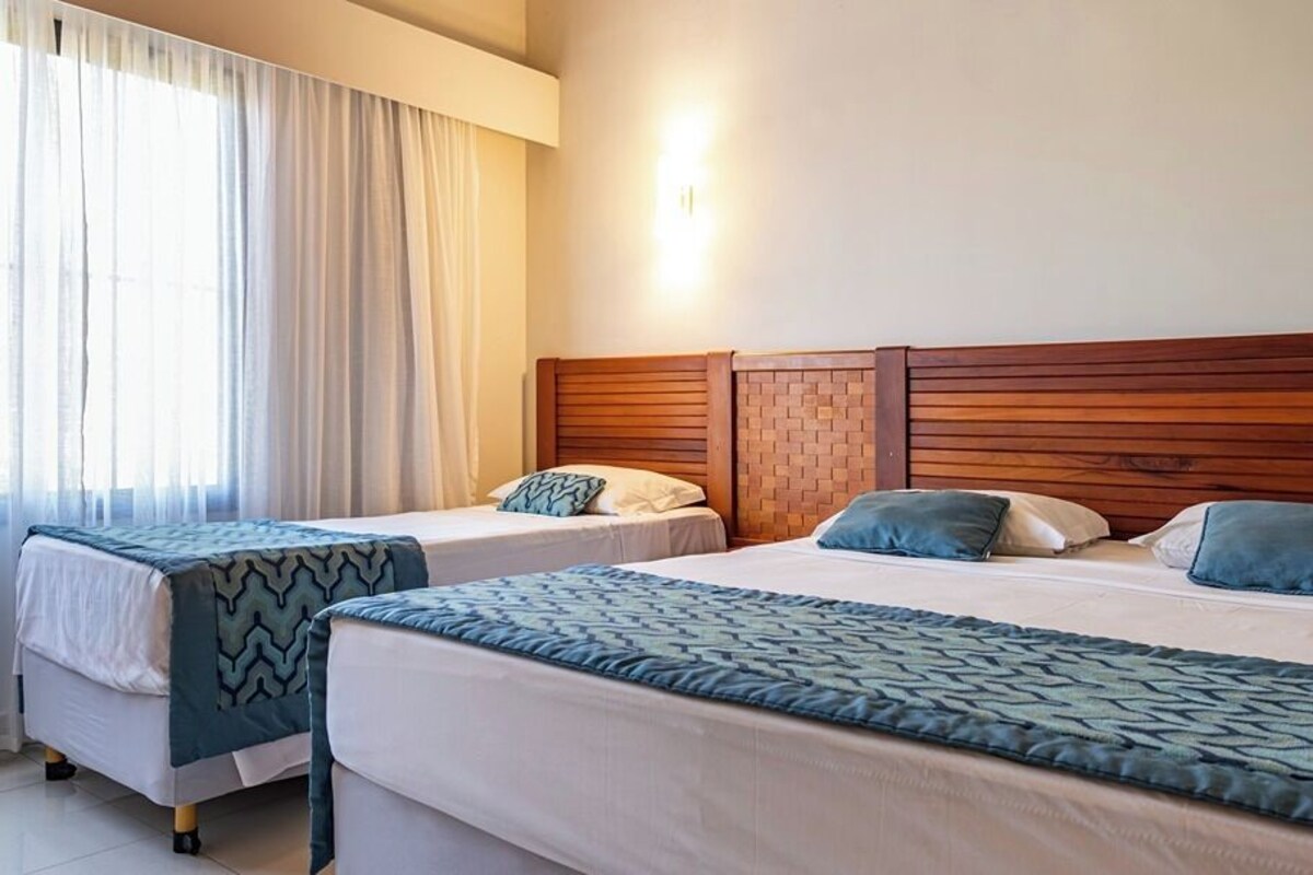 Family Suite | Minibar, in-room safe, desk, blackout drapes
