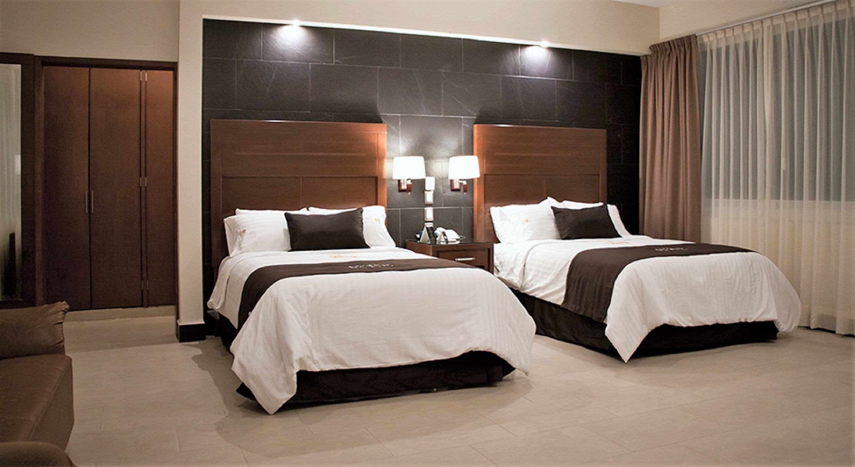 suite, 2 double beds | 1 bedroom, premium bedding, free minibar items, in-room safe