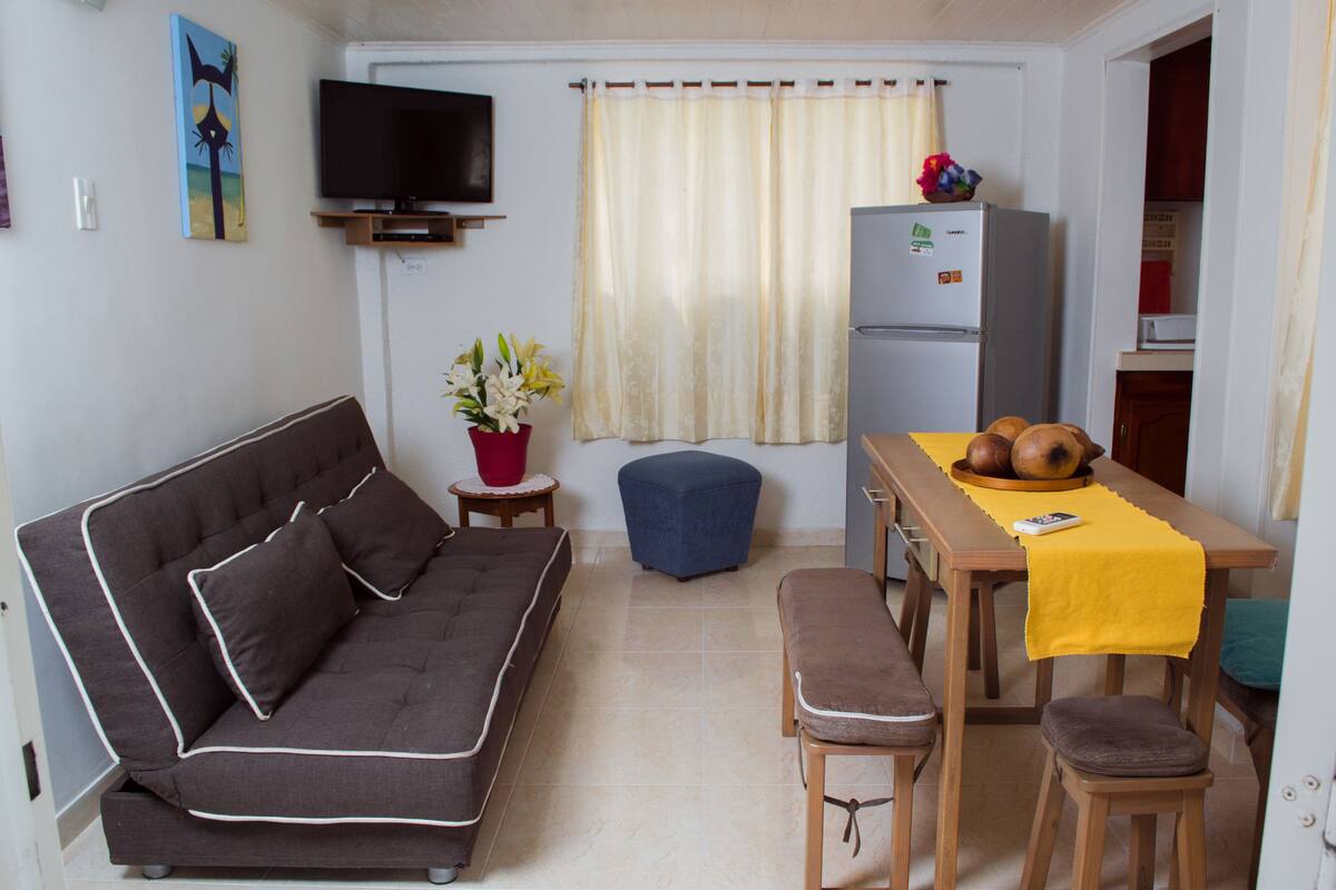 bungalow, 2 bedrooms, kitchen | living area | flat-screen tv