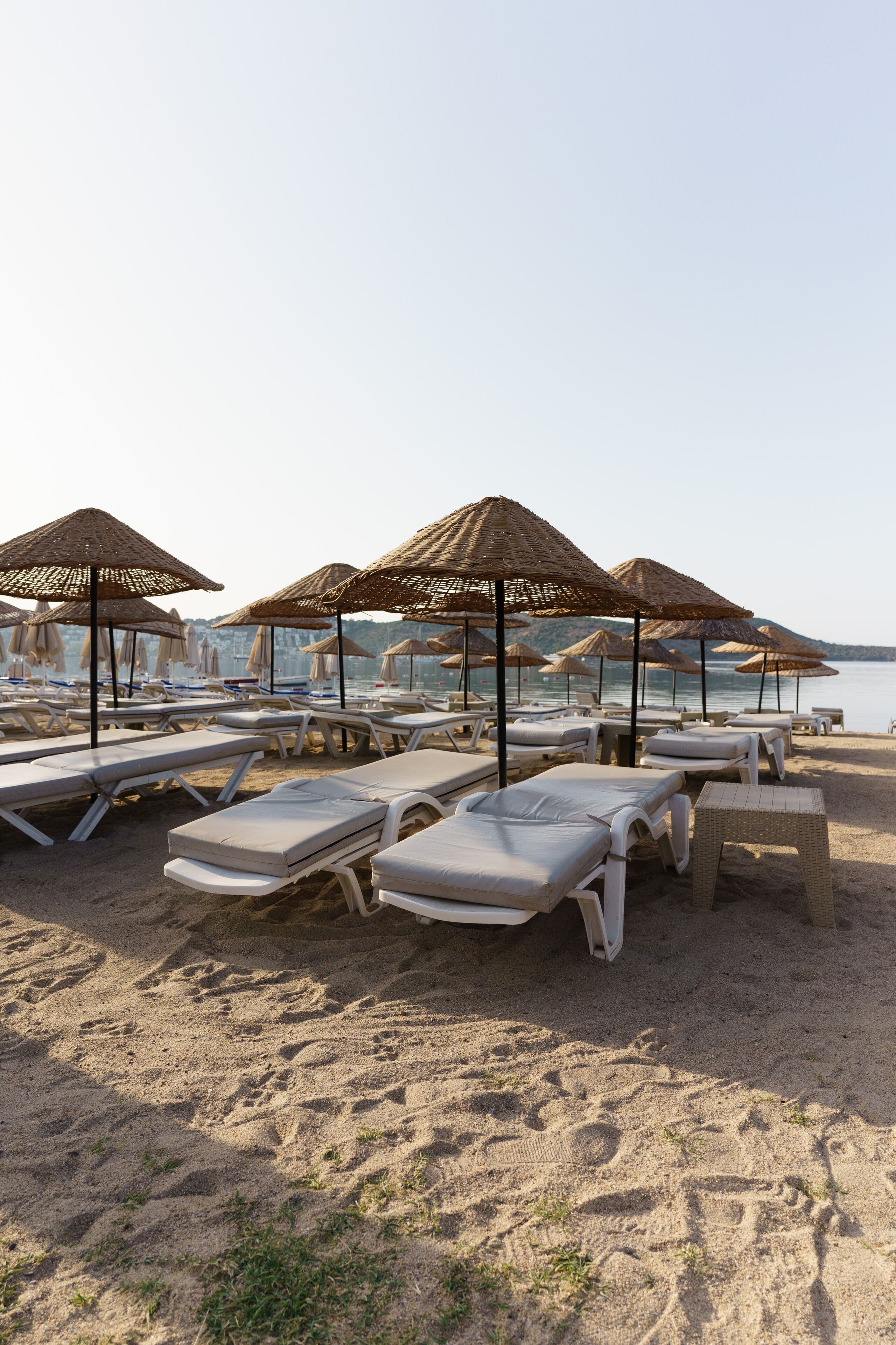 On the beach, sun-loungers, beach umbrellas