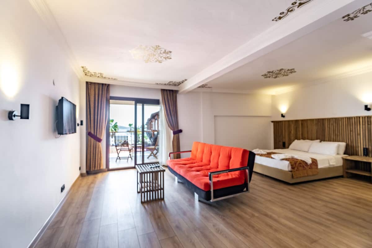 Studio suite | Een minibar, een kluis op de kamer, gratis wifi, beddengoed