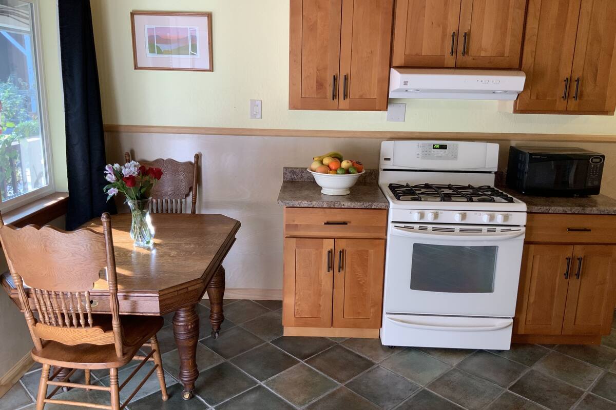 grand cottage, 1 king bed with sofa bed, kitchen, garden view | private kitchen