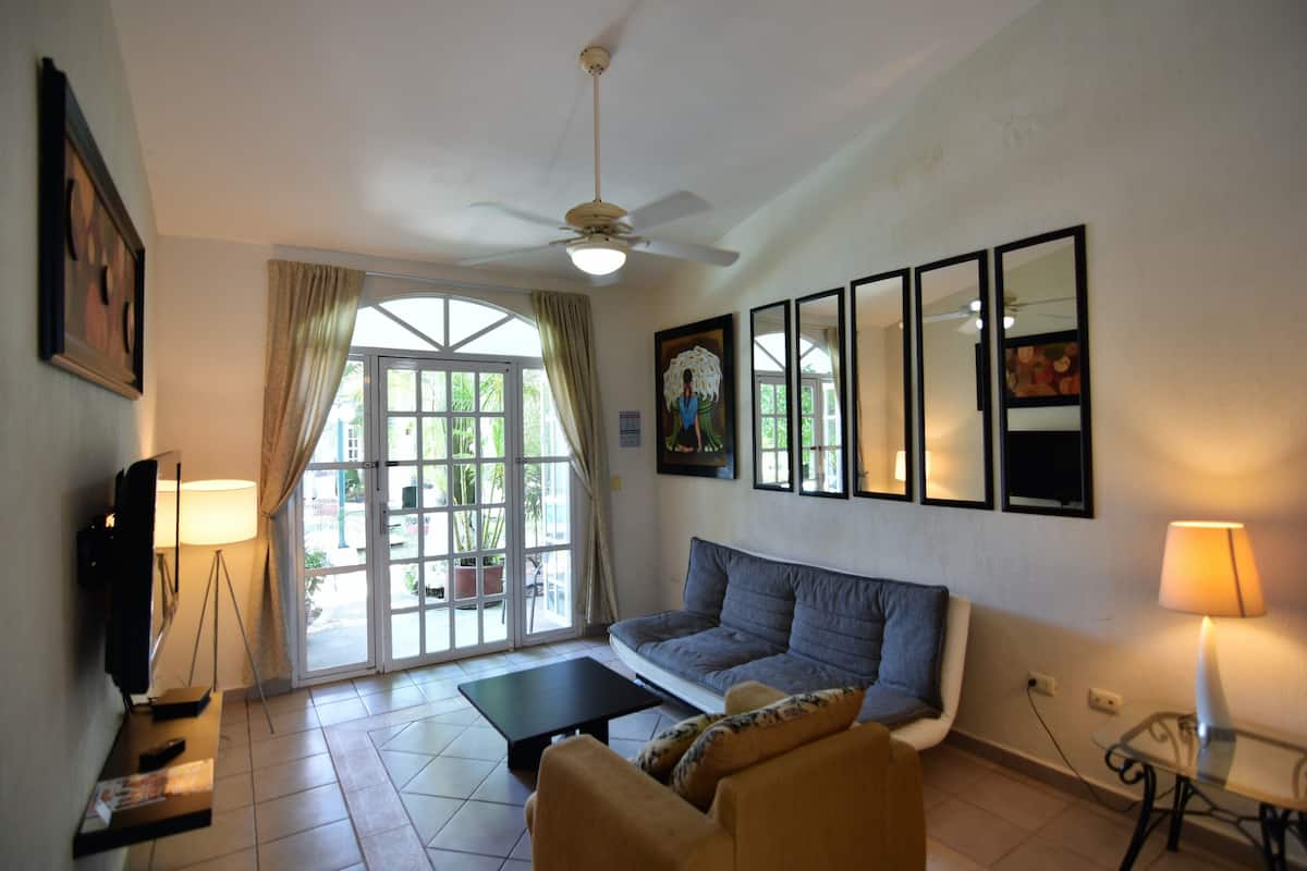 Comfort Villa, 2 Bedrooms, Pool View | Living area | 40-inch flat-screen TV with satellite channels, TV