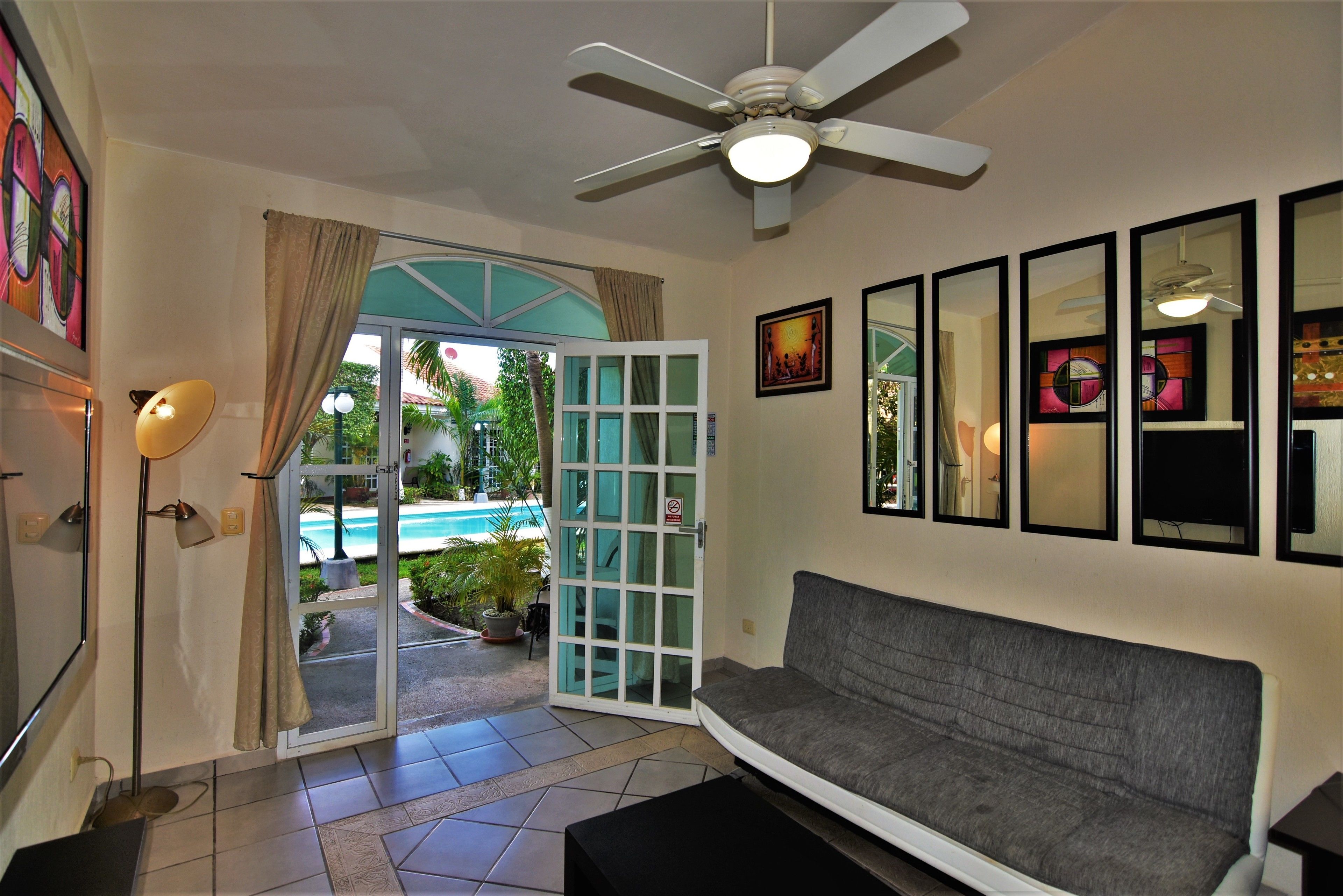 Comfort Villa, 2 Bedrooms, Pool View | Living area | 40-inch flat-screen TV with satellite channels, TV