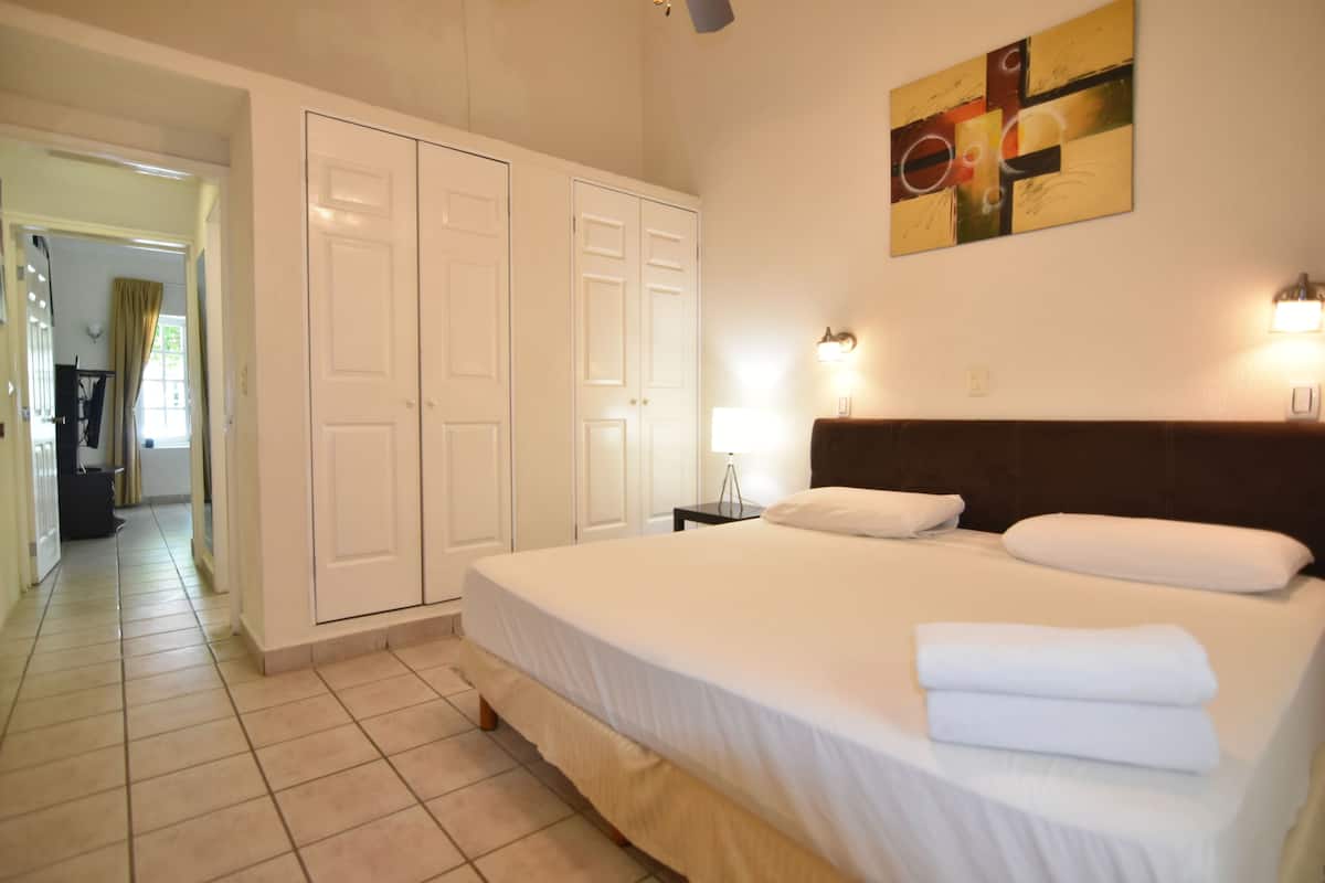 Double Room, Ensuite, Pool View | Iron/ironing board, WiFi (free), individually decorated, bed sheets
