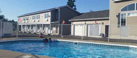 Seasonal outdoor pool, pool loungers