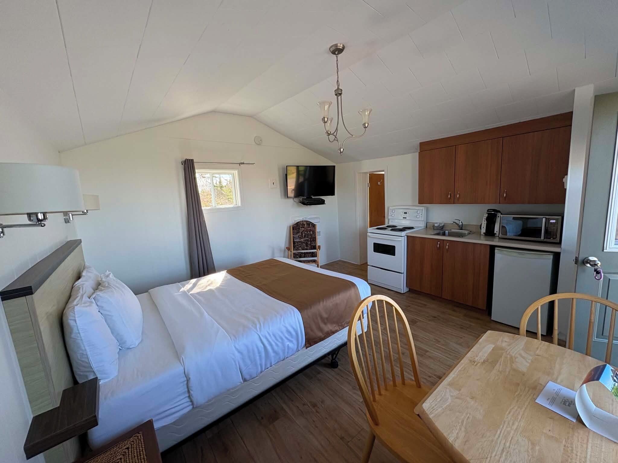 Chalet, 1 Double Bed, Balcony | Living area | Flat-screen TV