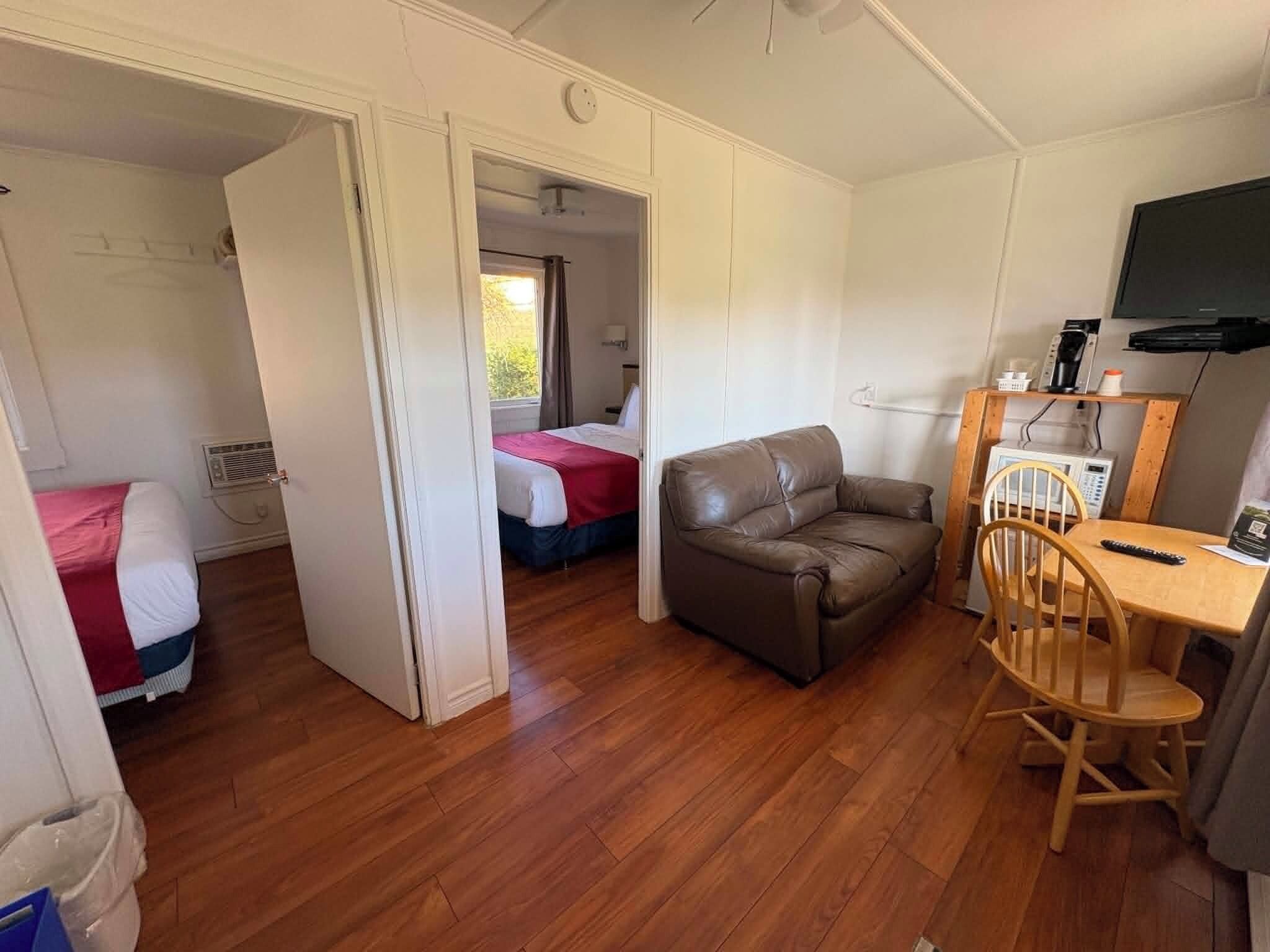 Chalet, 2 Double Beds, Balcony | Living area | Flat-screen TV