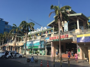 A multi-story building with a prominent 'Banzai' sign, suggesting a market or shopping area. - The Room Patong Hotel (Patong)