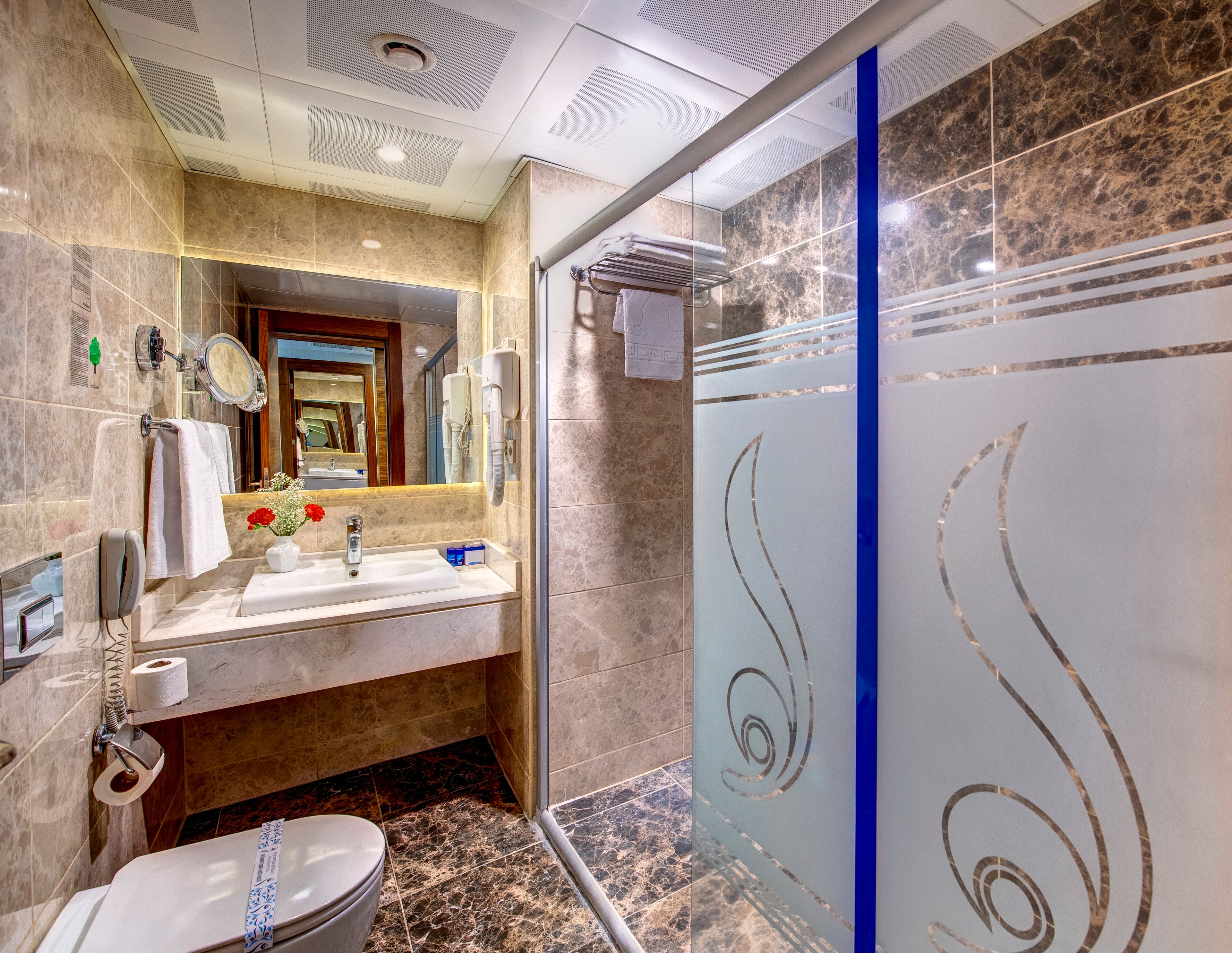 deluxe suit | bathroom | free toiletries, hair dryer, bathrobes, slippers