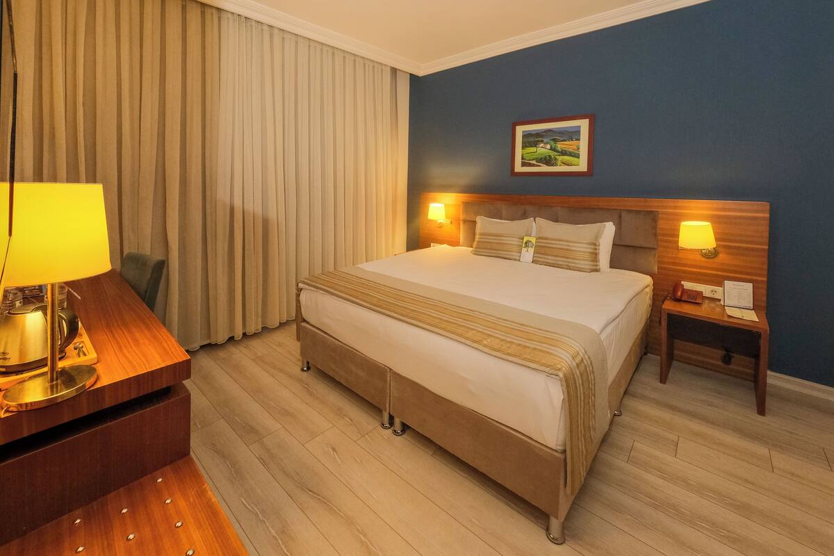 Ropa de cama de alta calidad y minibar 