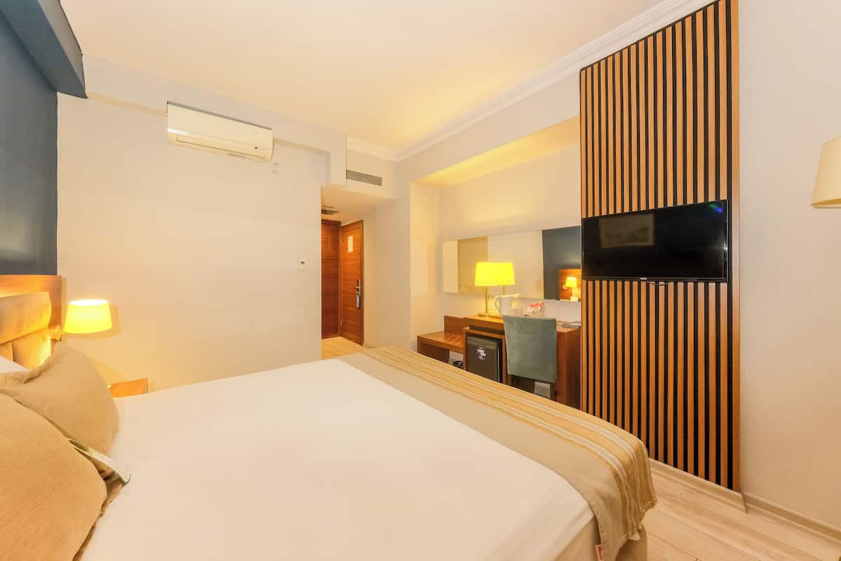 Ropa de cama de alta calidad y minibar