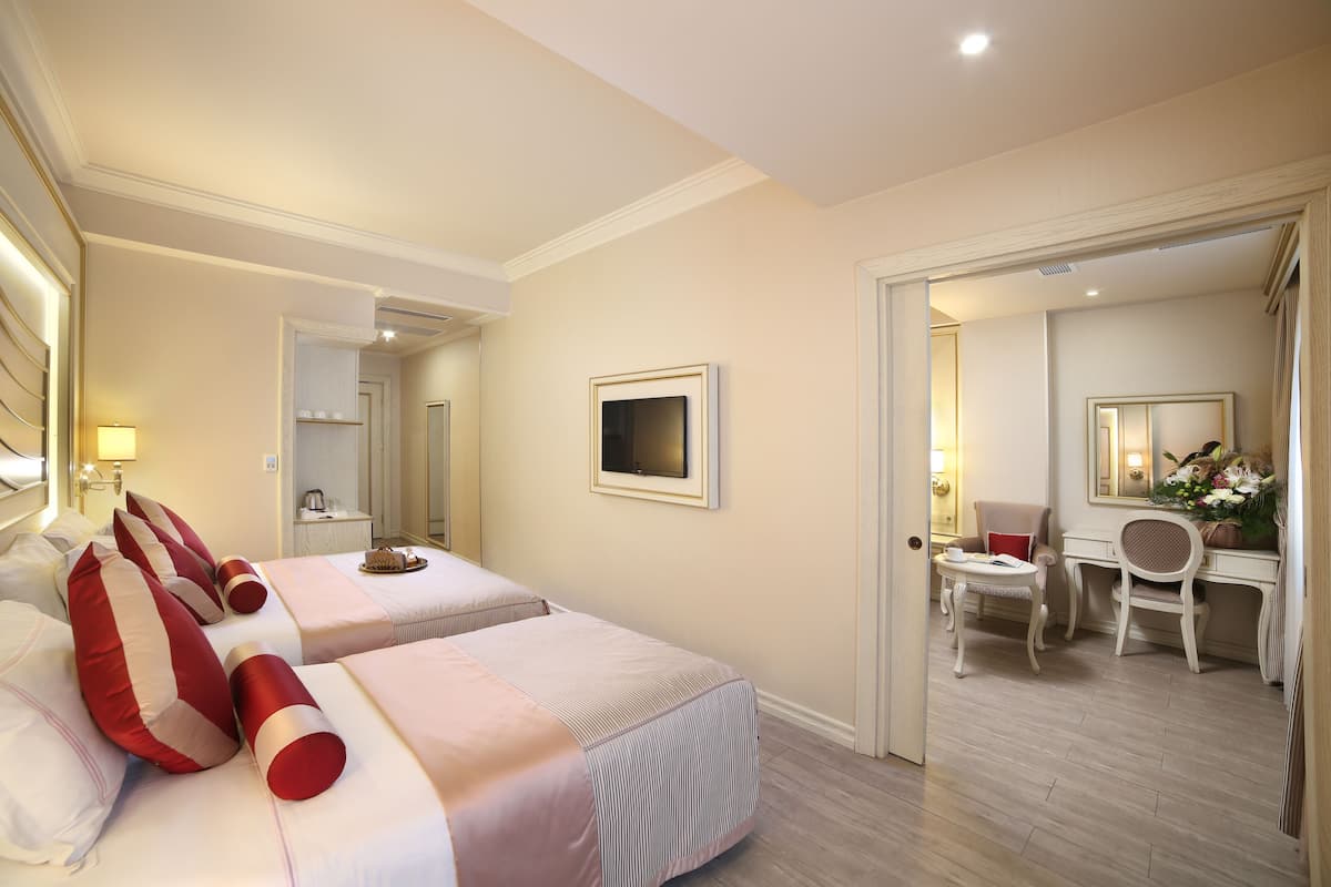 2 habitaciones, ropa de cama de alta calidad y minibar