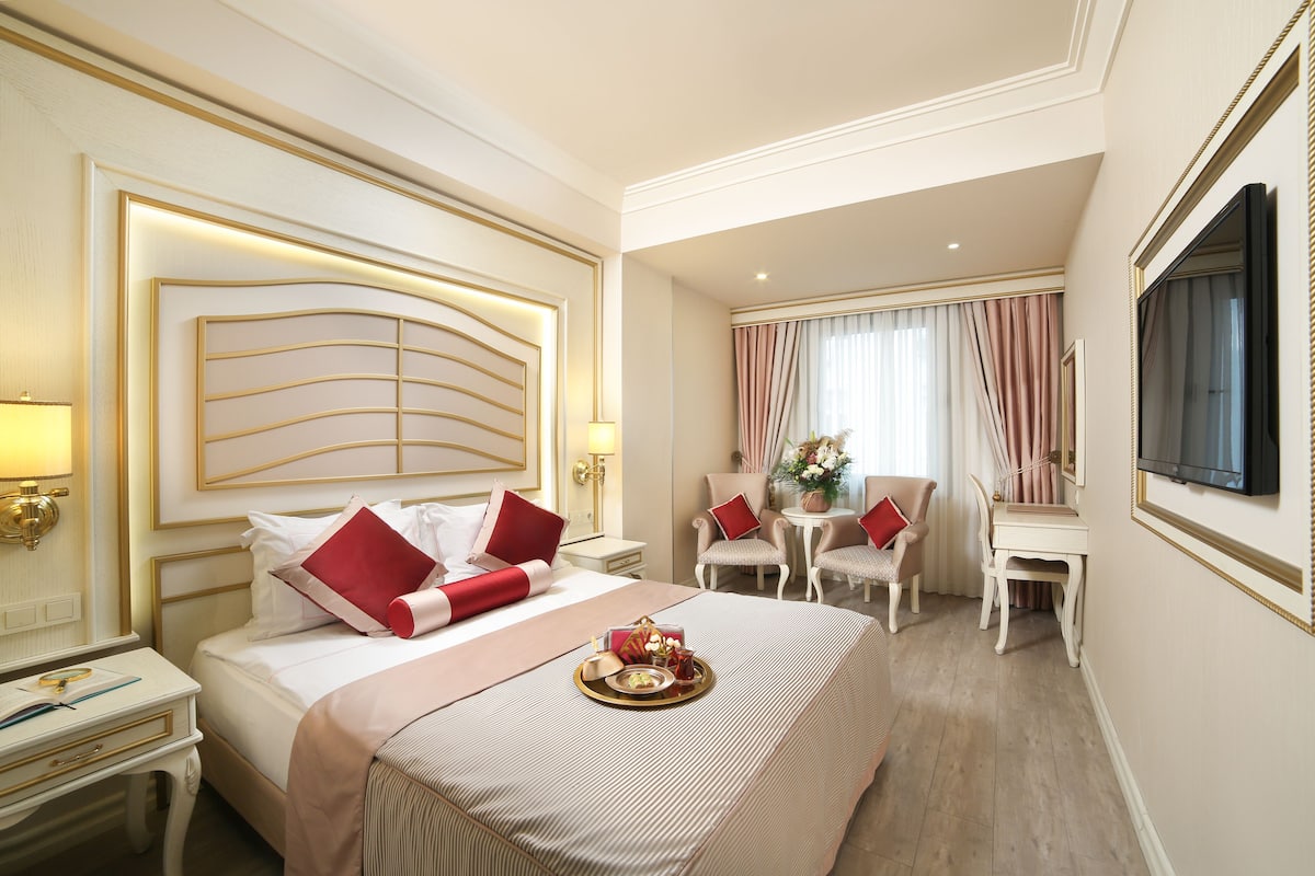 2 habitaciones, ropa de cama de alta calidad y minibar