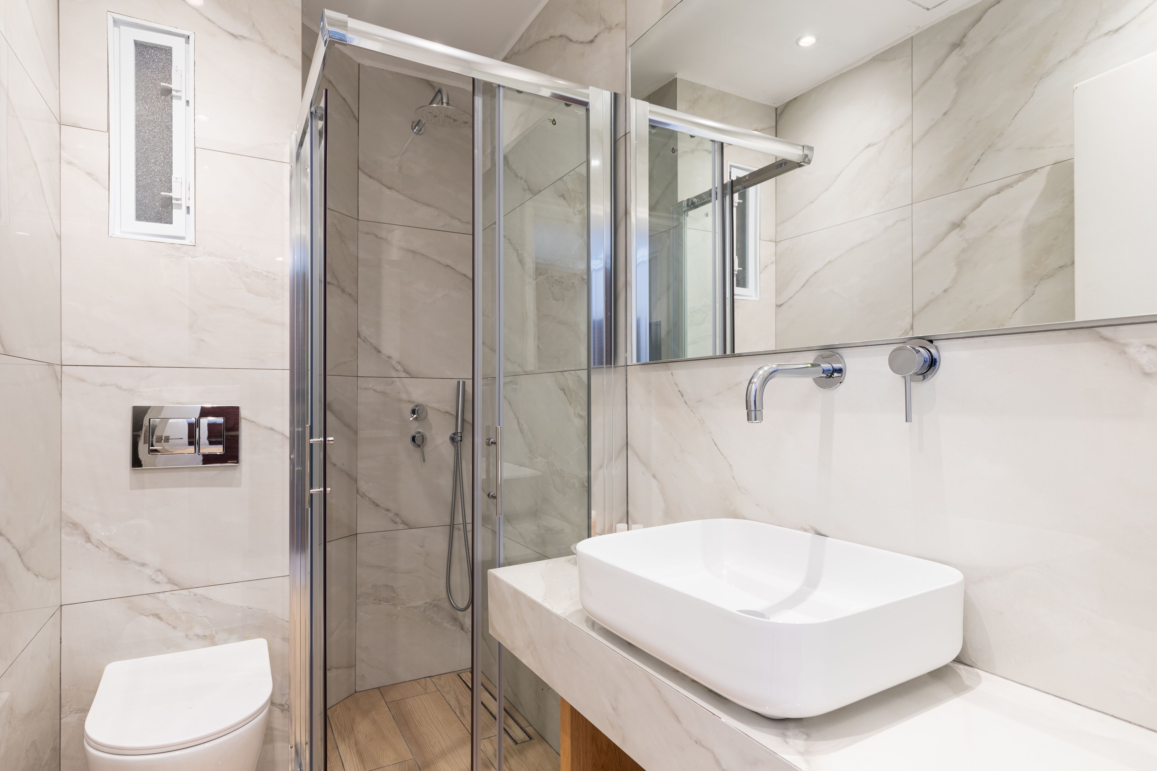 shower, rainfall showerhead, hair dryer, towels