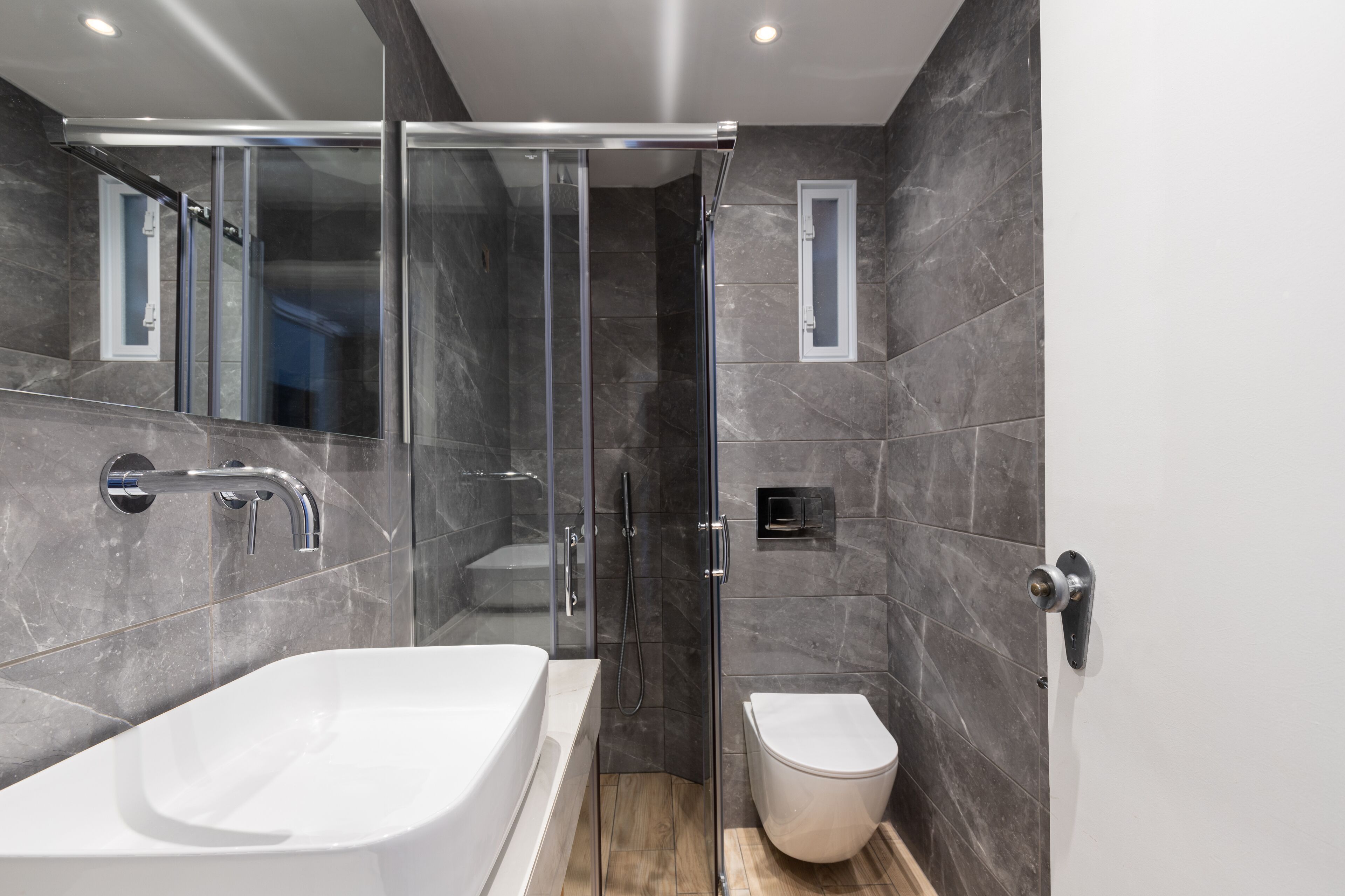 shower, rainfall showerhead, hair dryer, towels