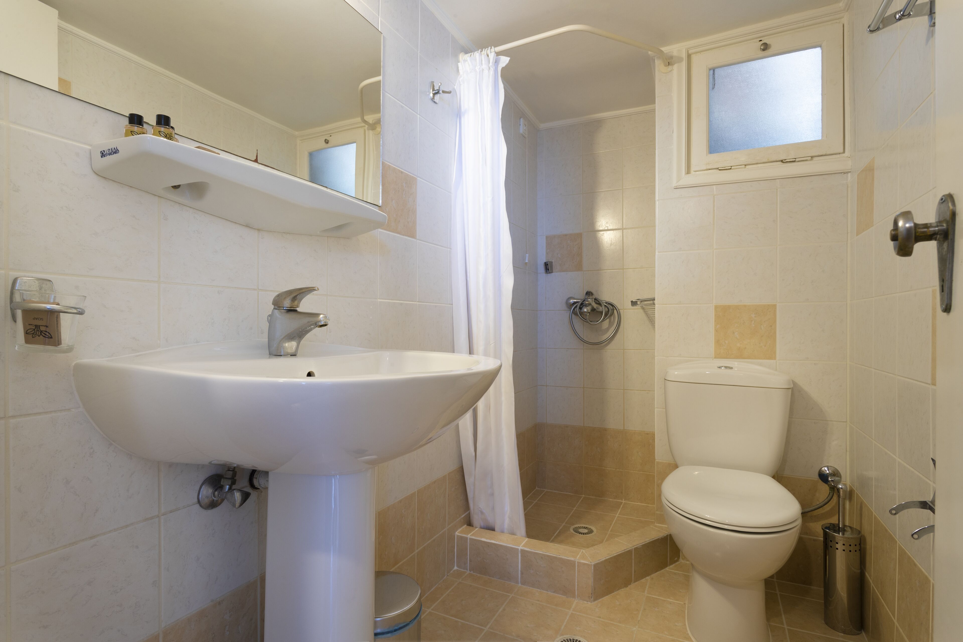 economy double or twin room | bathroom | shower, rainfall showerhead, hair dryer, towels