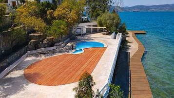 Outdoor pool, pool umbrellas, pool loungers