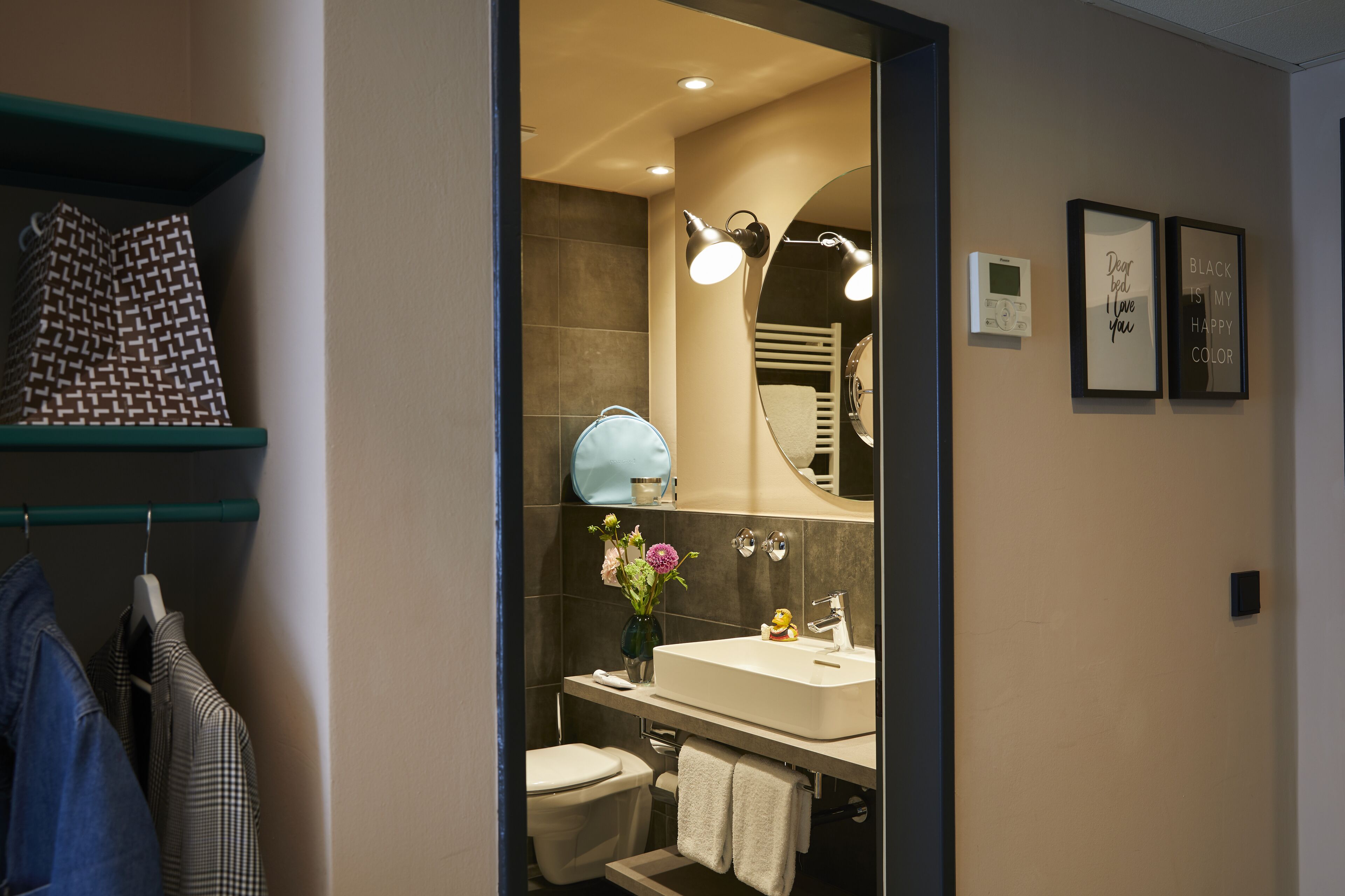 design suite | bathroom | shower, rainfall showerhead, eco-friendly toiletries, hair dryer