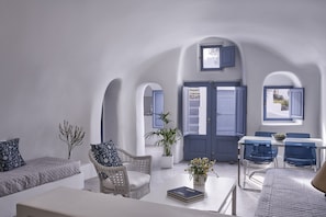 Grand Suite (Outdoor Private Jetted Tub) | Living area | 32-inch plasma TV with satellite channels, TV - Fava Eco Suites (Santorini)