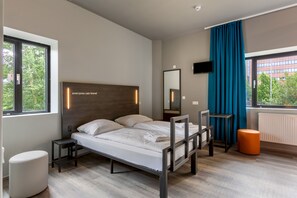 Habitación con 2 camas individuales, 2 camas individuales | Escritorio, cortinas blackout, wifi gratis y ropa de cama 