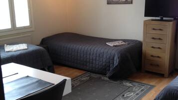Triple Room, Shared Bathroom | Free cribs/infant beds, rollaway beds, free WiFi