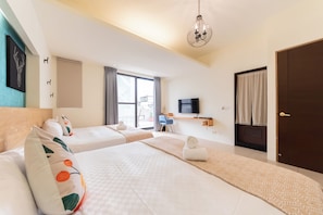 Quadruple Room, 2 Double Beds | Premium bedding, down comforters, free minibar, desk - Plentiful Inn (Hengchun)
