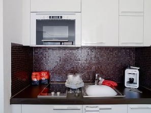 Full-size fridge, microwave, stovetop, coffee/tea maker - VISIONAPARTMENTS Lausanne Chemin des Epinettes (Lausanne)