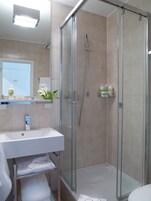 Hair dryer, towels, toilet paper