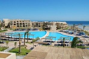 A resort with a large central pool, multiple smaller pools, and a beach area. - TUI MAGIC LIFE KALAWY - All inclusive (El Quseir)