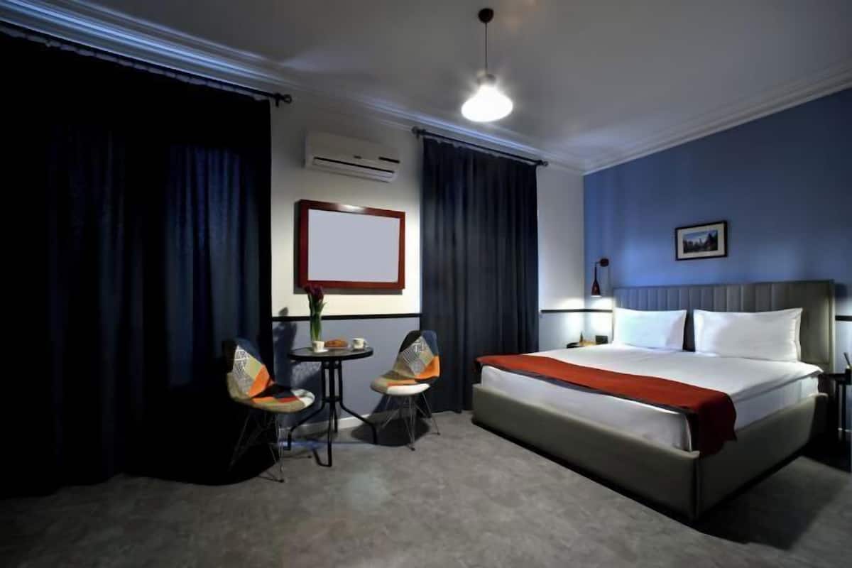 Minibar, desk, blackout drapes, soundproofing