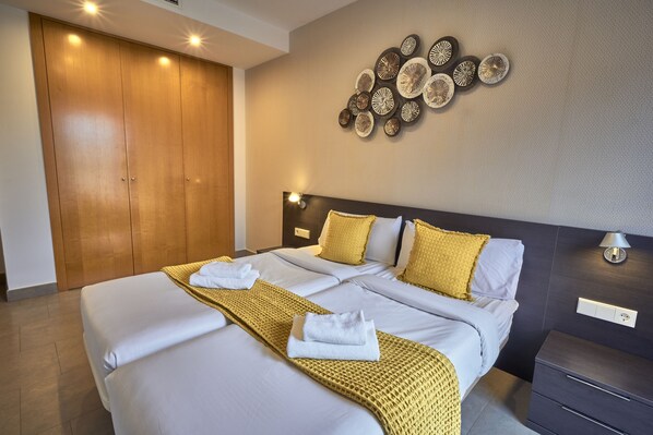 Couette en duvet d'oie, coffres-forts dans les chambres, bureau