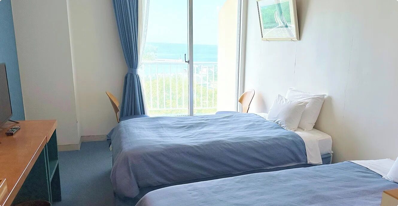 Corner Twin Room (1 room only on each floor), Non Smoking | In-room safe, laptop workspace, blackout curtains