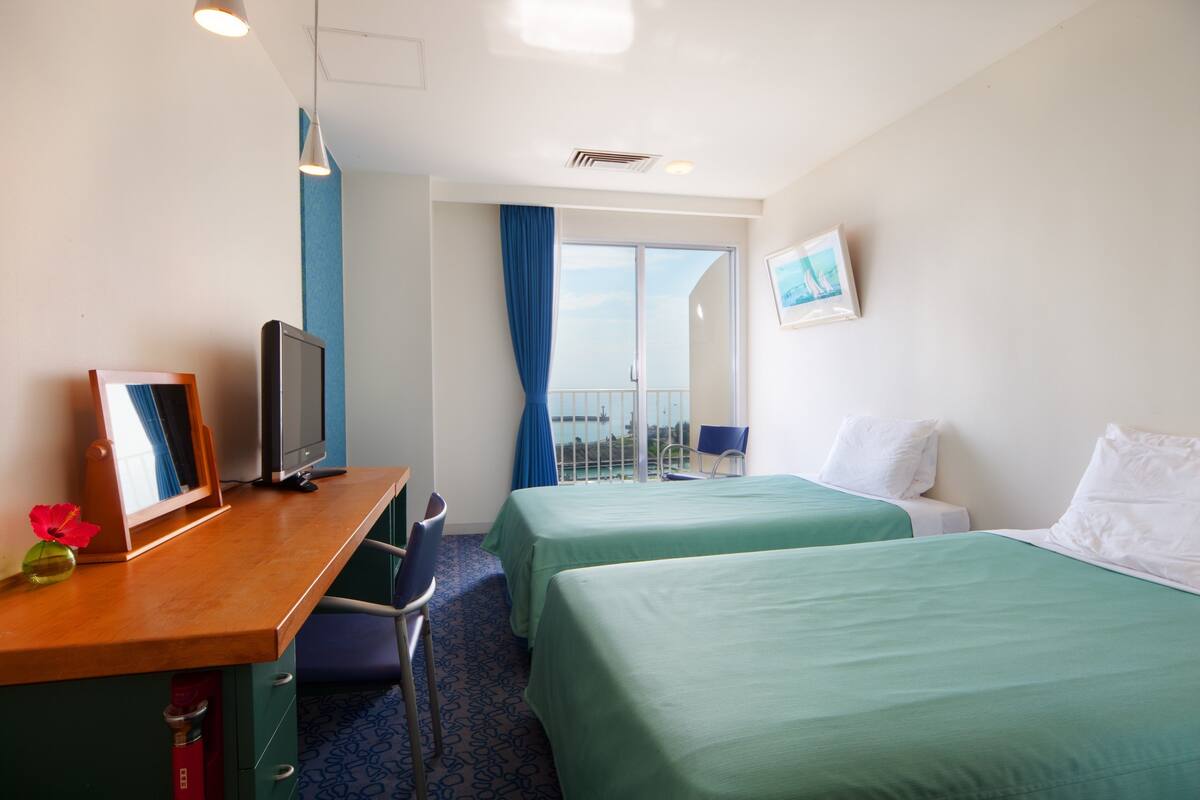 corner twin room (1 room only on each floor), non smoking | in-room safe, laptop workspace, blackout curtains